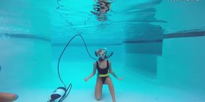 A perfect brunette girl Katya Nakolkina underwater