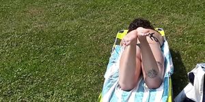 pawg sunbathing in the park