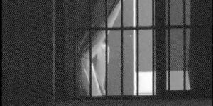 Fem is hiding boobs under bra on window voyeur video