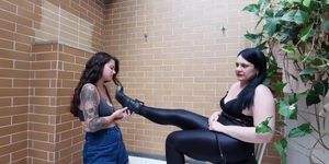 Mature mistress makes young slave girl to lick her boots then tramples her