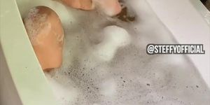 Latina takes a shower and fingering herself