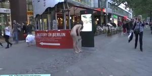 Naughty naked girl has fun on public streets