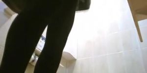 Asian women spied in toilet taking a pee