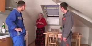 Granny takes two cocks