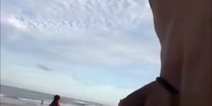 Horny daddy pisses and jerks off his penis on a black girl at the beach