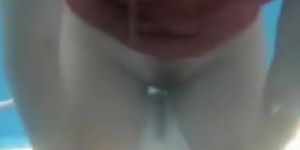 Spy cam trimmed pussy from the beach changing room