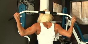 Sexy fitness blonde works out and shows her goods