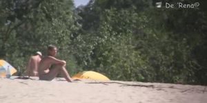 Nudist beach video of girls and guys lounging in the sun