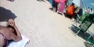 Beach voyeur films woman's asses in bikini