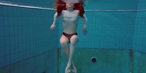 Underwater swimming girl Alice Bulbul