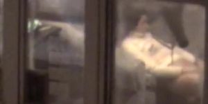 Lovely girl filmed masturbating through apartment window