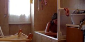 Young sister is spied naked in the bathroom