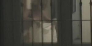 Blonde lady with naked natural tits in the voyeur thru window clip