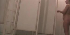 Shower spy cam amateur exposes boobs and hairy cunt