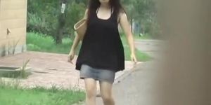 Sharking of an Asian girl wearing no panties under her skirt