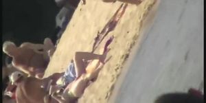 Naked tourists caught on beach spy cam relaxing and enjoying nudity (Human nature)