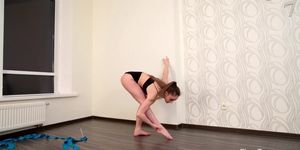 Super flexible young girl Anna Rugolmas