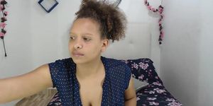 Spanish Mulatta teases until showing huge boobs and areolas