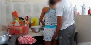 Guy gropes girlfriends ass in kitchen