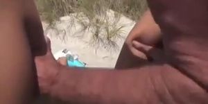 Young Asian wife having sex at beach