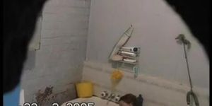 brunette girl gets nude and takes a quick bath in a shower porno