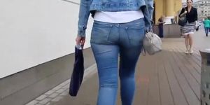 MILF's ass in tight jeans