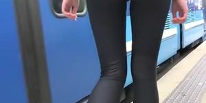 Girl wearing black leggings nice butt