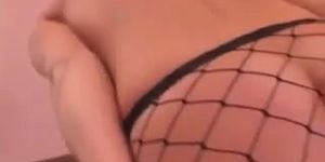 A fishnet blond toying and gets her ass fucked
