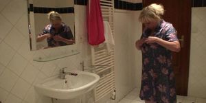 GRANNYBET - 70 yo granny gives tit-job and gets doggy-fucked