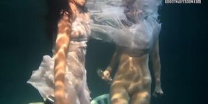 Polcharova and Siskina wet horny underwater lesbians