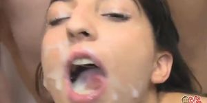 Girl takes tons of cum in her mouth