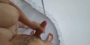 sexy step mom with big tits jerks off a dick in the shower