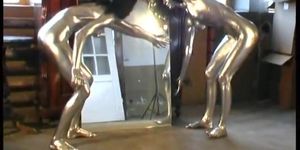 Lesbians completly painted in silver