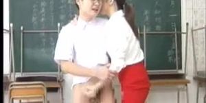 Cute Japanese student getting jacked-off by sexy teacher