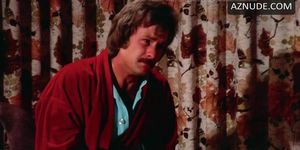N. Riddell in 1974 movie in floral blue panties