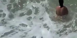 Small tits nudist swimming in the water