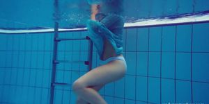 Marusia shows you her hairy sweet vagina in the pool