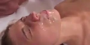 Bitch gets fucked while big cocks cum on her face, bukkake