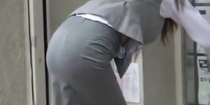 Hot office worker bending over and showing street candid ass
