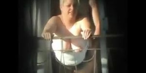 Spying Exhib Neighbour Fucking on Balcony