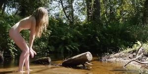 young teen nymph fairy Lada at a river