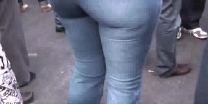 Sexy brunette round ass in pocketless jeans