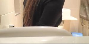 Hidden camera in bathroom spies woman
