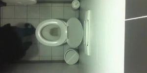 Spy camera in public toilet ceiling