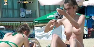 Young nudist babe caught on a hidden camera