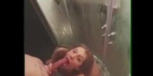 Blonde girl fucked under the shower and sucks dick