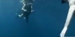 Inventive sex in the ocean with a scuba diving beauty (Babe man)
