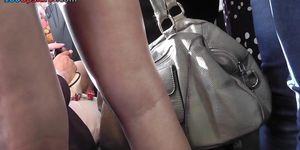 Long-haired brunette girl caught upskirt on bus
