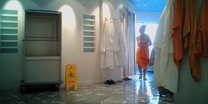 Girls in changing room are in bath robes and also naked