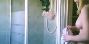 Sexy blonde on a spy cam shower vid